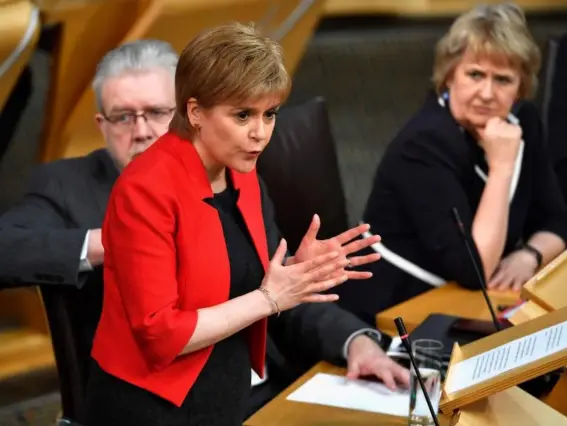  ?? (Getty) ?? Nicola Sturgeon speaks in the chamber on the first day of the 'Scotland's Choice' debate at Holyrood, Edinburgh