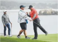  ?? The Associated Press ?? Ted Potter Jr. celebrates with his caddie after winning at Pebble Beach on Sunday.