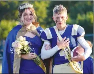  ?? Westside Eagle Observer/MIKE ECKELS ?? Abby Davis and Landon Watson were crowned queen and king during the 2022 Homecoming coronation ceremony at Bulldog Stadium in Decatur Friday night. Both Davis and Watson are seniors at Decatur High School.