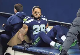  ?? ASSOCIATED PRESS ?? Seahawks free safety Earl Thomas was lost for the season after he suffered a broken left tibia while trying to break up a pass against the Carolina Panthers on Sunday night.