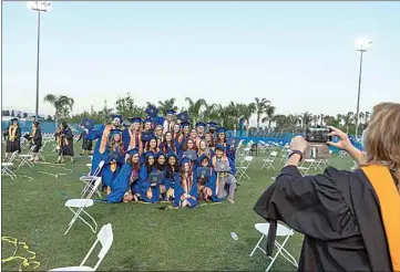  ?? PHOTOS COURTESY OF CSUB ?? CSUB nursing students take a group photo after their spring 2021 graduation ceremony.