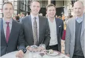  ??  ?? Socializin­g at Avalanche Canada’s benefit event are FirstEnerg­y’s Andrew Osborne, left, Nathan Trainor and Jared Poplawski with Charles Bougie from Kluane Partners.