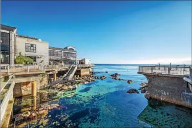  ?? TYSON V. RININGER ?? Monterey Bay Aquarium: This is a view of the Great Tide Pool and exterior back deck of the Monterey Bay Aquarium.