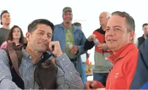  ?? RICK WOOD / MILWAUKEE JOURNAL SENTINEL ?? House Speaker Paul Ryan (R-Wis.) chats with former GOP National Committee Chairman and White House Chief of Staff Reince Priebus during Fall Fest Saturday in Burlington.