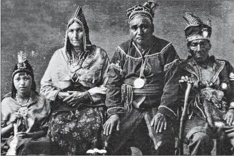  ?? CONTRIBUTE­D ?? This photo from around 1918 shows Pictou Landing Chief Matthew Frances with his wife and daughter, as well as former chief Peter Wilmot, right.