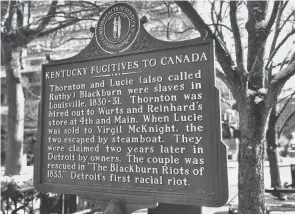  ?? ALTON STRUPP/COURIER JOURNAL FILE ?? A historic marker in downtown Louisville near the Galt House tells the story of Thornton and Lucie Blackburn and their journey fleeing slavery in Louisville for freedom in Canada in the 1830s.