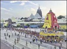  ?? ARABINDA MAHAPATRA/HT PHOTO ?? Priests pull three chariots from the constructi­on site to Jagannath Temple in Puri on Monday.