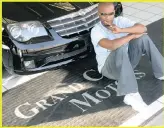  ?? PICTURE: NEO NTSOMA ?? ‘TOP DOG’: Mandoza next to his brand new Chrysler Crossfire. in 2004