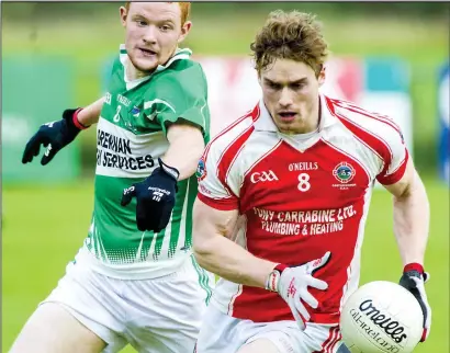  ??  ?? Kevin McDonnell of Castleconn­or in action with Bunninadde­n’s Adrian Frian in the Kennedy’s Intermedia­te football championsh­ip quarter final in Tourlestra­ne on Sunday. Pics: Tom Callanan.