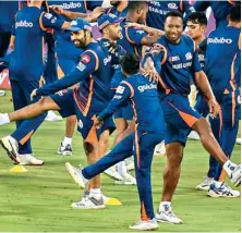  ?? PTI ?? Mumbai Indians players warm up during a training session in Hyderabad on Wednesday