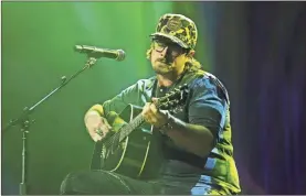  ?? Terry Wyatt/Getty images/Tns ?? Hardy performs onstage during NSAI 2022 Nashville Songwriter Awards at Ryman Auditorium in Nashville, Tennessee.