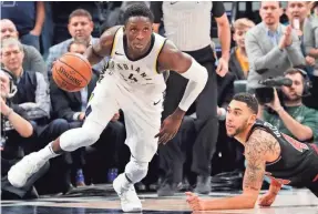  ??  ?? Pacers guard Victor Oladipo, beating Bulls guard Denzel Valentine for a loose ball, is averaging a career-high 24.5 points. BRIAN SPURLOCK/USA TODAY SPORTS