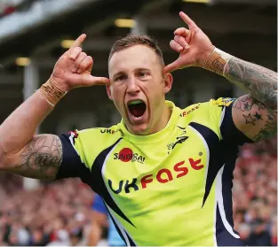  ??  ?? Shark attack: Byron McGuigan celebrates scoring for Sale