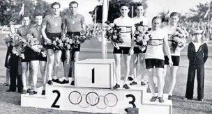  ??  ?? ●●Alan Geldard and his teammates at the 1948 medal ceremony