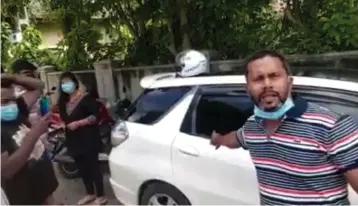  ??  ?? Mr Wasantha Medagoda, spokesman for SLTCU explains the ordeal that his colleague went through when some men tried to seize his vehicle while he was driving along the Colombo - Chilaw main road with his wife and children