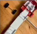  ??  ?? Using the ride-height position of the existing front axle, measure (remember to add an extra 3mm of drop for the axle grooves), cut and glue into place up-stands from the chassis at the new axle locations as shown on the drawing.