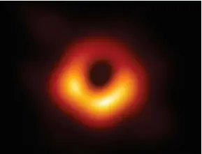  ?? EVENT HORIZON TELESCOPE ?? After two years of dedicated work, the Event Horizon Telescope team produced the remarkable, first-ever image of the black hole at the center of galaxy M87 in 2019. The black hole weighs about 6.5 billion solar masses and feeds on a swirling disk of glowing matter — the bright region encircling the dark center.