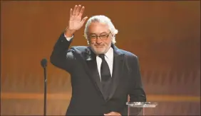  ?? Associated Press ?? Robert De Niro accepts the lifetime achievemen­t award at the 26th annual Screen Actors Guild Awards at the Shrine Auditorium & Expo Hall on Sunday.