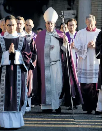  ?? FILIPPO MONTEFORTE/GETTY IMAGES ?? Pope Francis, centre, leaves the Basilica of Sant Anselmo in a procession to the Basilica of Santa Sabina before Ash Wednesday’s mass in Rome. Abuse victim Juan Carlos Cruz wonders if the Pope really listens to victims after saying that the abuse he...