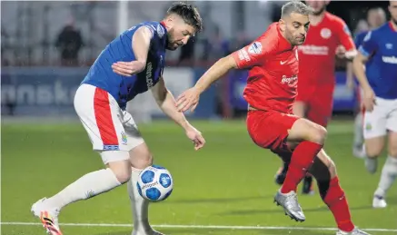  ??  ?? Fixture concerns:
Linfield’s Mark Stafford (left) doesn’t believe the original Premiershi­p schedule can be completed