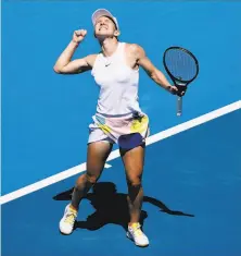  ?? Dita Alangkara / Associated Press ?? Simona Halep celebrates after defeating Anett Kontaveit 61, 61 in just 53 minutes during their quarterfin­al match.