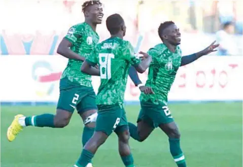  ?? ?? The Flying Eagles celebrate their victory against Italy