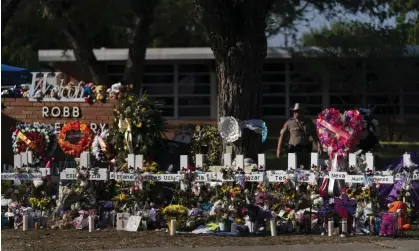  ?? A memorial outside Robb elementary school in Uvalde, Texas. Photograph: Jae C Hong/AP ??