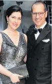  ?? ALLEN MCINNIS ?? IMPRESSION MAKERS: Anne-Marie Fontaine in MAR by Maria Karimi and husband, ball co-chair Richard Voyer, in a bespoke tuxedo make their mark.