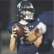  ?? (NWA Democrat-Gazette/Charlie Kaijo) ?? Springdale Har-Ber quarterbac­k Drue McClendon (15) looks to pass Friday during a football game against North Little Rock in Springdale. Check out nwaonline.com/200905Dail­y/ for today’s photo gallery.