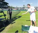  ??  ?? Cashing out: Daniil Medvedev tosses coins at the vacant umpire’s chair