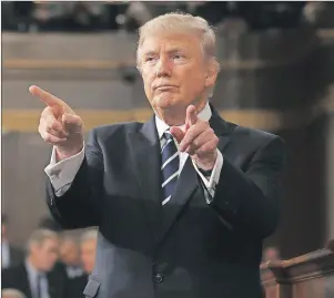  ??  ?? U.S. President Donald Trump reacts after addressing a joint session of Congress on Capitol Hill in Washington, on Tuesday.