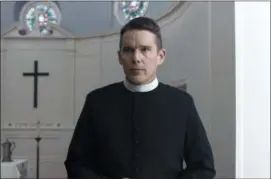  ?? A24 VIA AP ?? This image released by A24 shows Ethan Hawke in a scene from “First Reformed.”