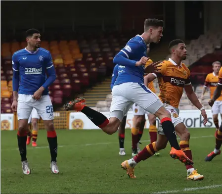  ??  ?? Cedric Itten equalisers for Rangers, after Devante Cole, below, had given Motherwell the lead in the first half