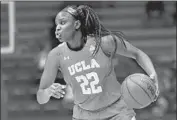  ?? Tomas Ovalle Associated Press ?? UCLA’S KENNEDY BURKE has compiled more than 1,000 points, 500 rebounds and 100 blocks.