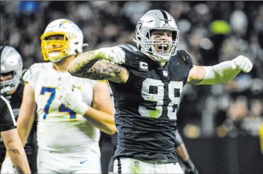  ?? L.E. Baskow Las Vegas Review-journal @Left_eye_images ?? Raiders defensive end Maxx Crosby had eight sacks and 100 quarterbac­k pressures during the 2021 season. Those numbers and his leadership on the field landed him in his first Pro Bowl.