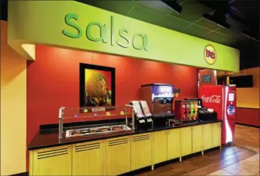  ?? SUBMITTED PHOTO ?? Moe’s Southwest Grill is planning an expansion in the region, with 6 to 12 new stores planned, according to Moe’s President Bruce Schroder. The first new stores, he said, will likely be in Chester County. This photo shows the salsa bar inside a Moe’s restaurant.