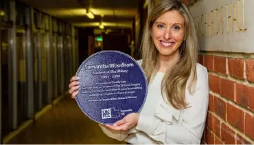  ?? ?? BACK TO SCHOOL: Samantha Woodham, co-founder of The Divorce Surgery, after the unveiling of her Purple Plaque following a presentati­on at her former school, The Abbey School, Reading having been awarded the Women