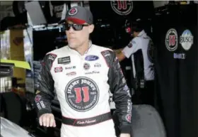  ?? TERRY RENNA — ASSOCIATED PRESS ?? Kevin Harvick stands in the garage during qualifying for the NASCAR Cup Series race at Homestead-Miami Speedway in Homestead, Fla.