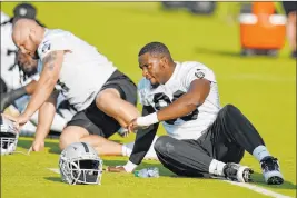  ?? John Locher The Associated Press ?? Clelin Ferrell, right, has to take what he learned as a rookie and prove this season to the Raiders coaches that he was worthy of being selected so high in the draft.