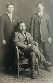  ??  ?? Frank Delorme, seated, with sons Octave, left, and Daniel in Broadview, Sask., circa 1916.