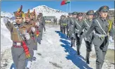  ?? PTI ?? Indian and Chinese soldiers celebrate the new year along the Indo-china border in Arunachal Pradesh on Jan 1, 2019.