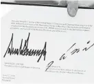  ?? SAUL LOEB/AFP/GETTY IMAGES ?? Signed by Donald Trump and Kim Jong Un.