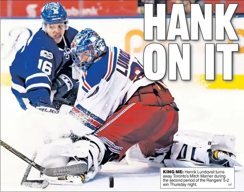  ?? AP ?? KING ME: Henrik Lundqvist turns away Toronto’s Mitch Marner during the second period of the Rangers’ 5-2 win Thursday night.