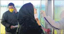  ?? WASEEM ANDRABI/HT ?? A health worker taking a nasal swab from a woman at a test centre in Srinagar on Tuesday.