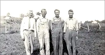  ?? Photograph submitted ?? A photograph from the 1930s taken in front of Carlos Lynch’s farm on Sugar Creek west of Brightwate­r shows the sons of Andy Jack Lynch — from left: William, Carlos, Harry and John. The building on the left was on Harry Lynch’s farm; the building on the...