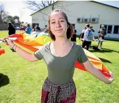  ?? DOMINICO ZAPATA/STUFF ?? Maddy Walker of Waikato Queer Youth was thrilled with the turnout at the Pride in the Park event at Claudeland­s Park yesterday.