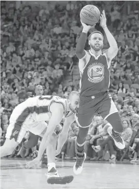  ?? Scott Strazzante / San Francisco Chronicle ?? Manu Ginobili, left, and the Spurs had little success trying to keep pace with the Warriors and Stephen Curry, who had a game-high 36 points. But Ginobili showed he has something left in the tank with 15 points and seven assists.