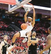  ?? KIRK IRWIN/GETTY ?? Roddy Gayle Jr. of Ohio State dunks the ball during the first half of the game on Sunday.