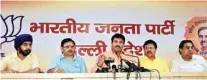  ?? PIC/PTI ?? Delhi BJP chief Manoj Tiwari, along with party leaders, addresses a press conference in Delhi on Wednesday