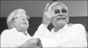  ??  ?? Nitish Kumar (right) and Lalu Yadav in happier times.